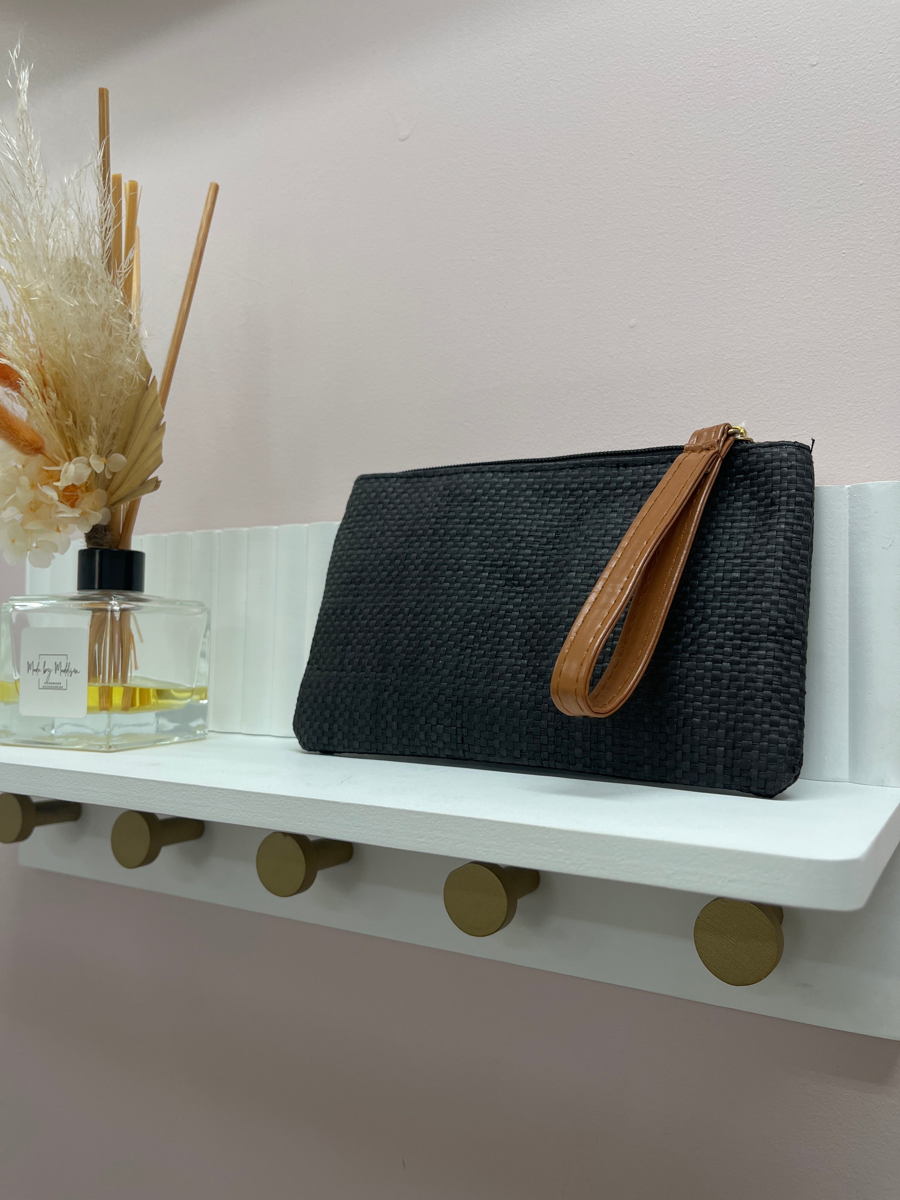 Black straw clutch